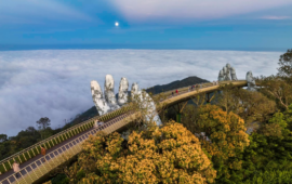 Where is the Golden Bridge Vietnam? Tourist symbol on top of Ba Na Hills  